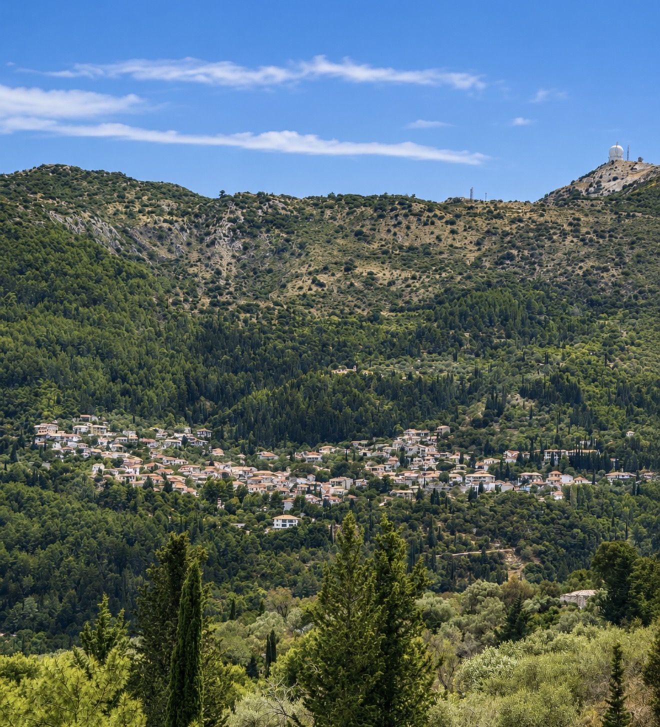 Traditional Lefkada village nestled in the green hillside